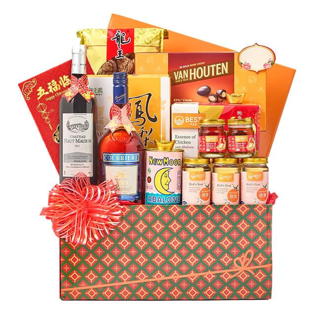 Chinese New Year festive hamper with assorted gifts, wine, and decorative floral ribbon, ideal for flower delivery in Singapore