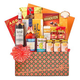 Chinese New Year festive hamper with assorted gifts, wine, and decorative floral ribbon, ideal for flower delivery in Singapore
