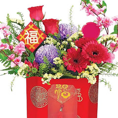 Festive flower arrangement in a red box for Chinese New Year flower delivery