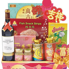 Festive gift hamper with gourmet snacks, wine, and treats for gift delivery in Singapore