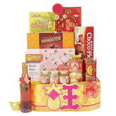 Festive gift hamper with snacks and treats, ideal for special occasion flower delivery