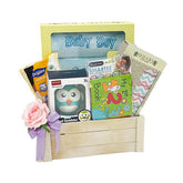 Baby boy flower delivery hamper with plush toy, book, and essential gifts in a wooden box