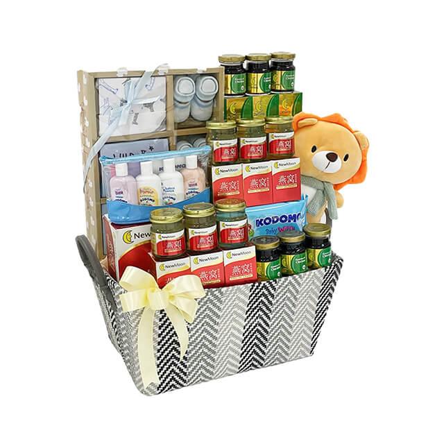 Flower delivery gift basket with health foods, baby essentials, plush lion, and yellow ribbon