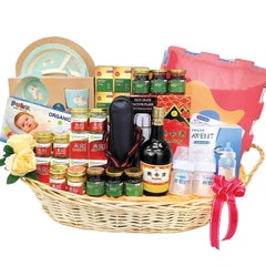 Flower delivery gift basket with baby essentials, bottled supplements, soft toy, and yellow roses