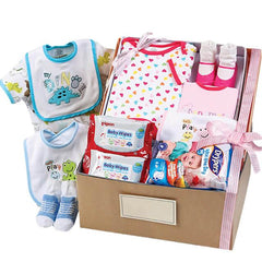 Baby gift hamper with clothes, bibs, baby wipes, diapers and ribbon for flower delivery