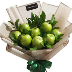 Green apple fruit bouquet with leaves, ideal for healthy flower delivery in Singapore