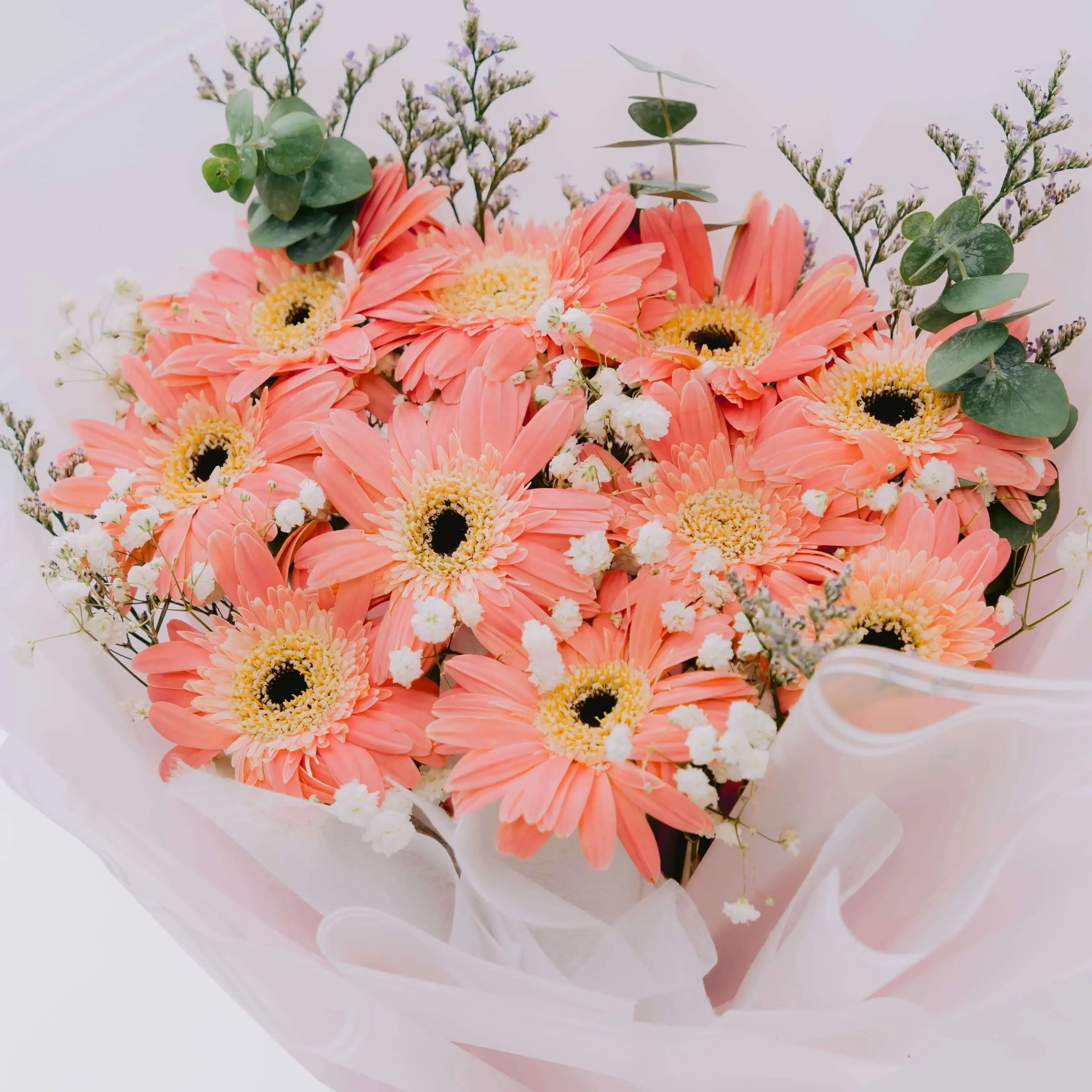 Fresh pink gerbera bouquet with baby’s breath, ideal for same-day flower delivery