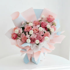 Elegant pink rose bouquet with white flowers for flower delivery in Singapore