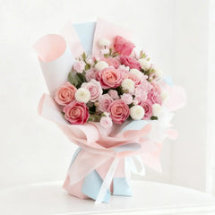 Fresh pink rose bouquet with white accents, ideal for flower delivery in Singapore