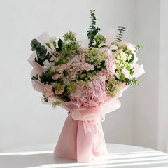 Pink hydrangea bouquet with eucalyptus, perfect for flower delivery across Singapore