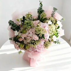 Pink hydrangea and eucalyptus bouquet for same-day flower delivery in Singapore