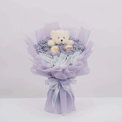 Purple baby's breath bouquet with plush bear, perfect for flower delivery in Singapore