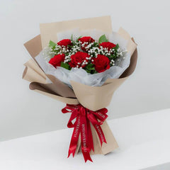 Red roses bouquet with baby’s breath, ideal for flower delivery in Singapore