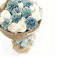 Elegant white roses and blue chrysanthemums bouquet wrapped in burlap, perfect for flower delivery in Singapore