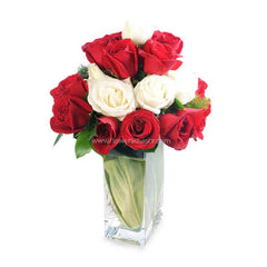 Vase arrangement of fresh red and white roses for flower delivery