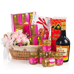 Wellness hamper with fresh pink rose arrangement, health products and gift basket for flower delivery