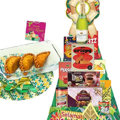Festive gift hamper with assorted snacks and Raya greeting, ideal for flower delivery gifts