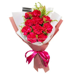 Red carnation bouquet wrapped with pink ribbon, ideal for Singapore flower delivery
