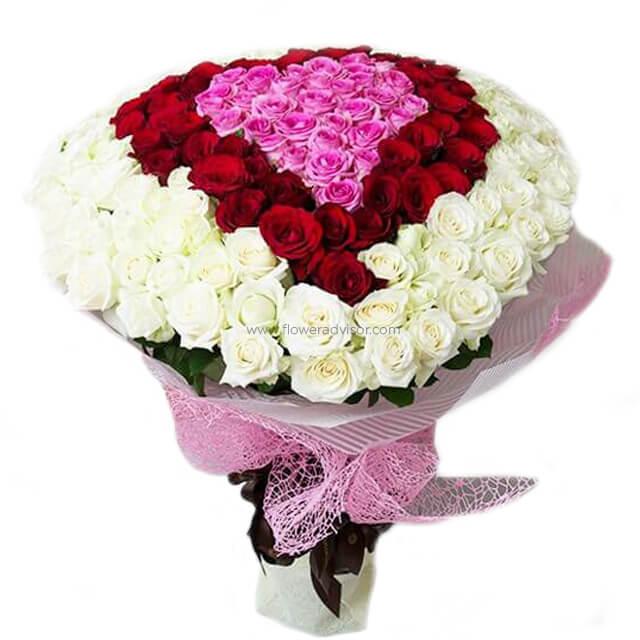 Heart-shaped mixed roses bouquet for flower delivery, wrapped in pink lace