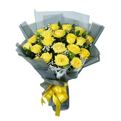 Yellow rose bouquet with green leaves and white filler flowers, perfect for flower delivery