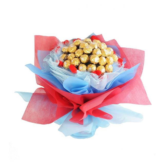 Chocolate bouquet with Ferrero Rocher, red and blue wrapping, perfect for flower delivery