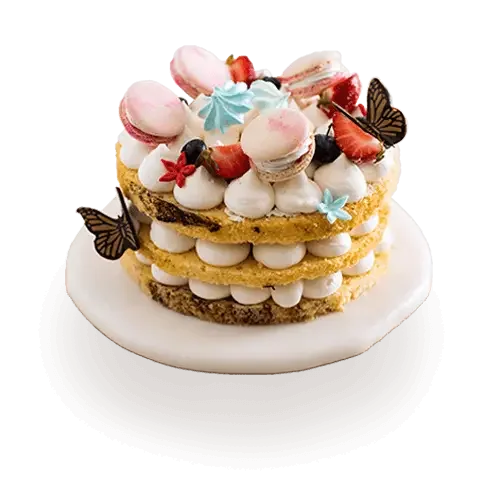 Delicate layered cake with macarons, berries, and butterflies — perfect for flower delivery occasions