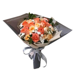 Champagne and orange rose bouquet with white fillers, ideal for flower delivery in Singapore