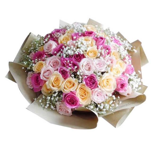 Bouquet delivery of 45 mixed roses in pink, yellow and baby’s breath, perfect for gifting