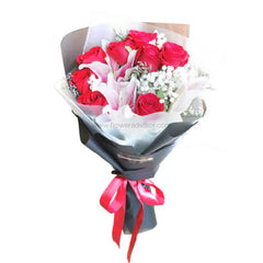 Hand-tied bouquet with 8 red roses and 3 pink lilies for flower delivery