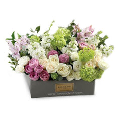Elegant flower delivery box with mixed roses, poms, and lush fillers for gifting