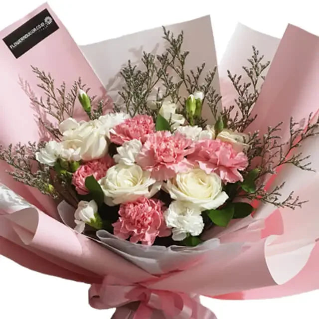 Hand bouquet with pink and white flowers, ideal for flower delivery in Singapore