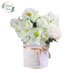 Elegant white flower bouquet in a gift box for fresh flower delivery in Singapore