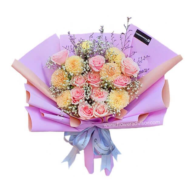 Pink rose and yellow chrysanthemum bouquet with baby’s breath, ideal for flower delivery in Singapore