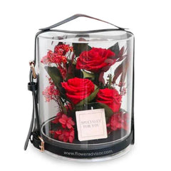 Red preserved flowers in a clear round case, perfect for flower delivery gift in Singapore