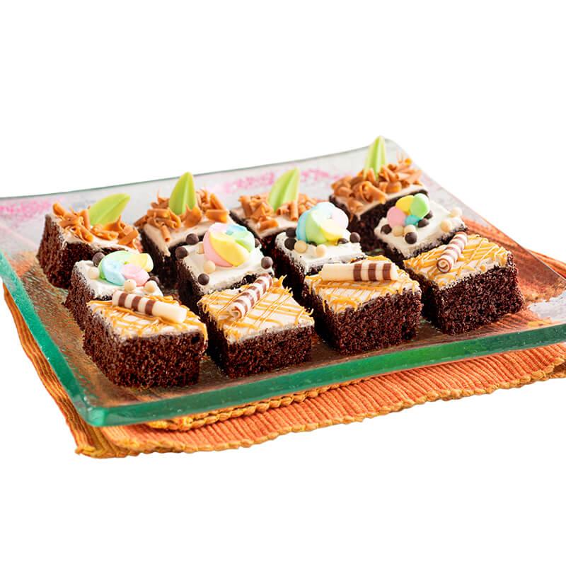Gift box assortment of decorated brownies, perfect for flower delivery and gifting.
