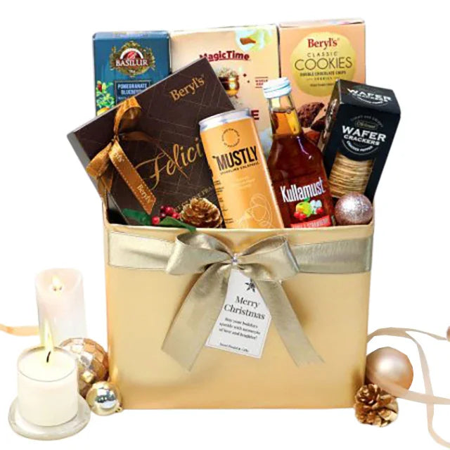 Festive gift hamper with flowers, cookies, chocolates and tea for delivery in Singapore