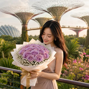 Woman holding a bouquet of lavender roses, flower delivery in Singapore garden