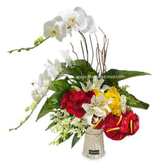 Fresh flower arrangement with red roses, yellow and white blooms in vase for delivery