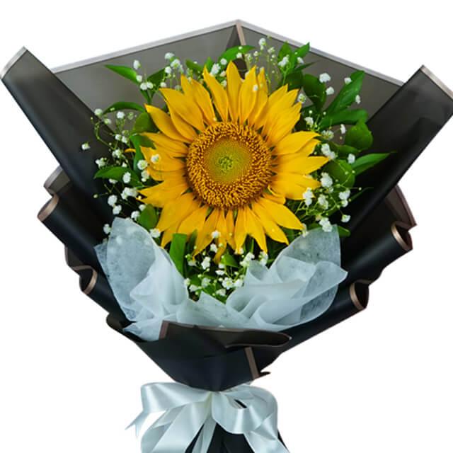 Single sunflower bouquet with greenery, available for same-day flower delivery in Singapore