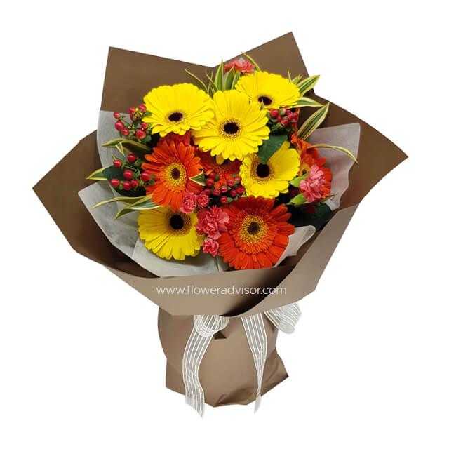 Vibrant bouquet with yellow and orange gerbera daisies, ideal for flower delivery in Singapore