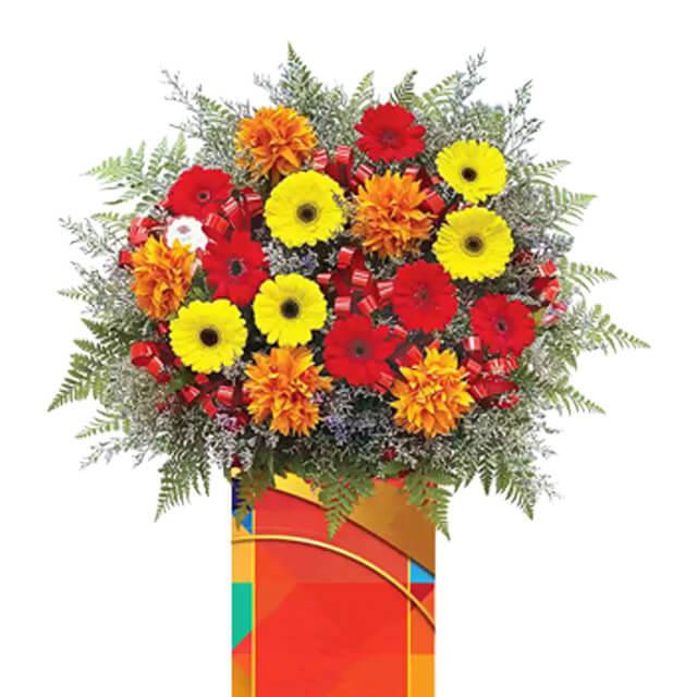 Grand opening flower stand with bright red, yellow, and orange blooms for flower delivery