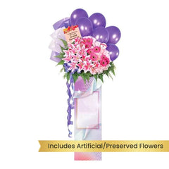Grand opening flower stand with pink lilies, gerbera daisies, purple balloons, flower delivery