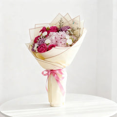 Elegant mixed flower bouquet with roses and hydrangeas, perfect for flower delivery