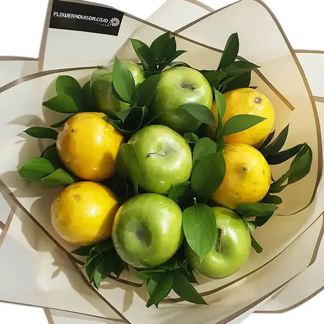 Fruit bouquet with green apples, yellow pears, and green leaves, ideal for flower delivery