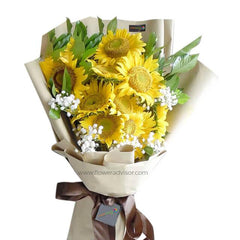 Fresh sunflower bouquet with greenery, ideal for summer flower delivery in Singapore