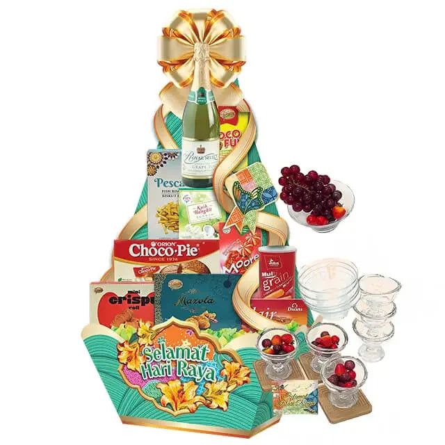 Hari Raya festive food hamper with snacks, fruit, glassware, and gift ribbon for delivery