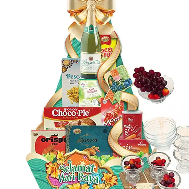 Hari Raya gift hamper with assorted snacks, fruit bowl, and sparkling drink for delivery
