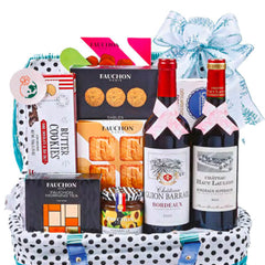 Gift basket with red wine, cookies, tea, and treats for special flower delivery occasions