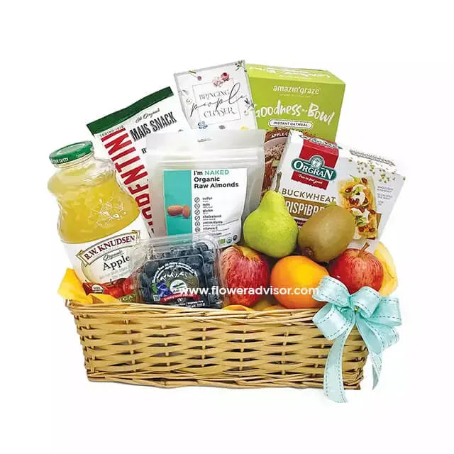Fruit and snack hamper gift basket for flower delivery, featuring apples, pears, juice, and healthy treats.