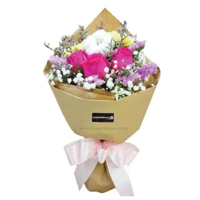 Vibrant flower bouquet with pink roses, yellow carnations, and cotton, ideal for flower delivery